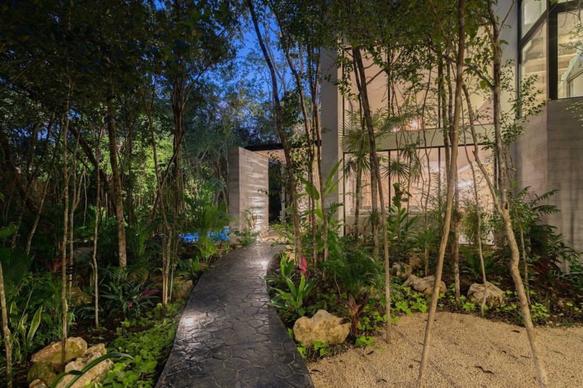 Villa 2 is a remarkable 4-bedroom, 4-bathroom residence nestled - photo 3