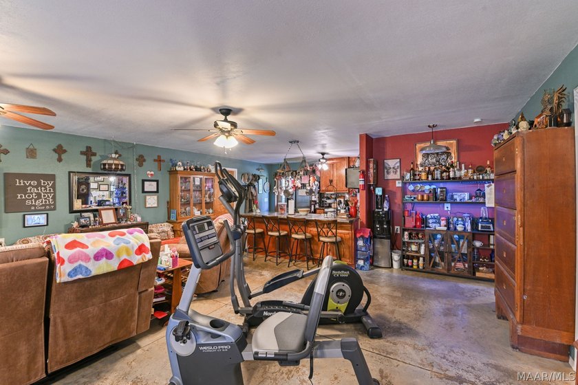 Charming 3 bedroom, 2 bath barndominium-style home offering - photo 33