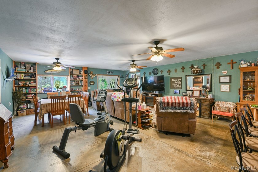 Charming 3 bedroom, 2 bath barndominium-style home offering - photo 36