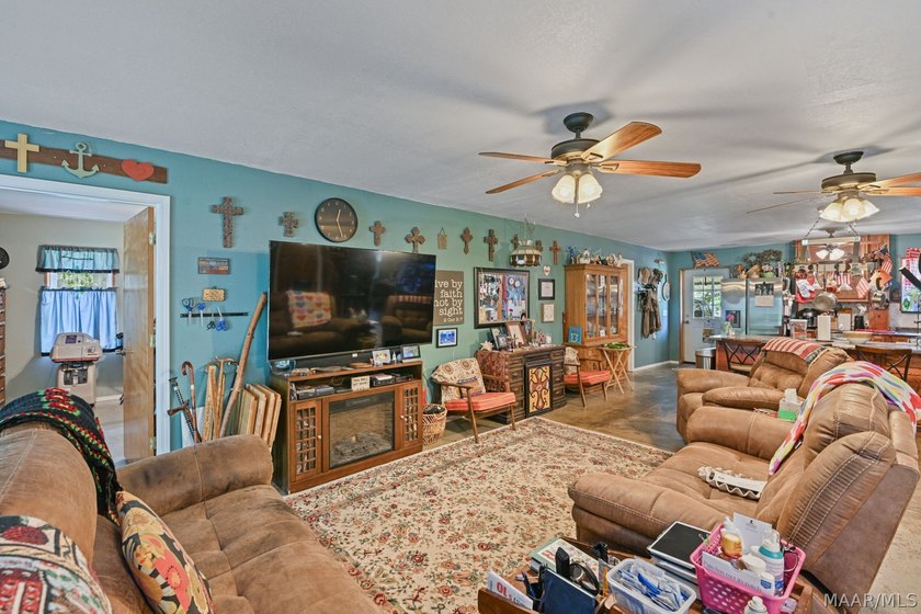 Charming 3 bedroom, 2 bath barndominium-style home offering - photo 44