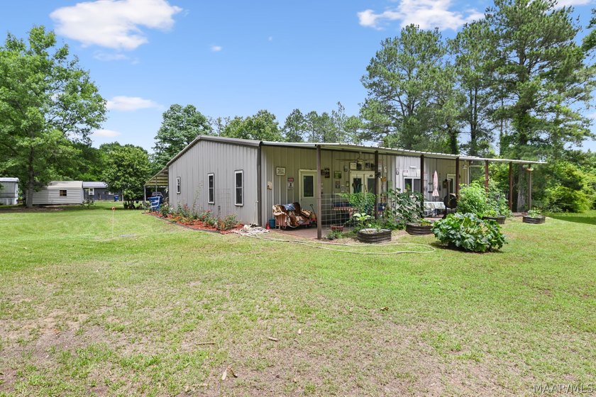 Charming 3 bedroom, 2 bath barndominium-style home offering - photo 46