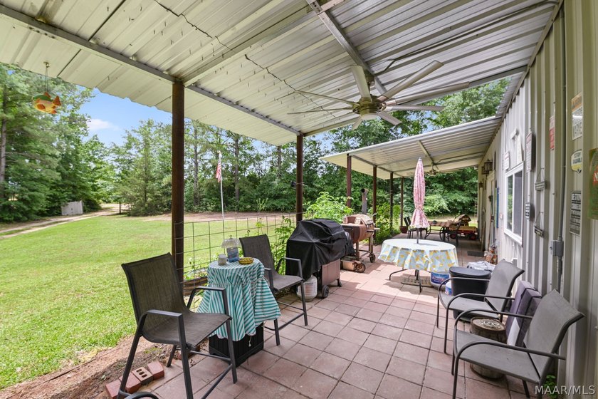 Charming 3 bedroom, 2 bath barndominium-style home offering - photo 49