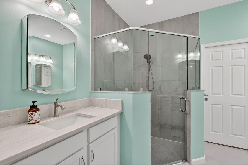 Experience low-maintenance living in LakePark at Tradition, an - photo 16