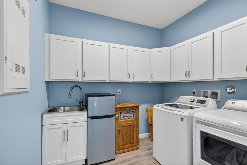 Experience low-maintenance living in LakePark at Tradition, an - photo 23