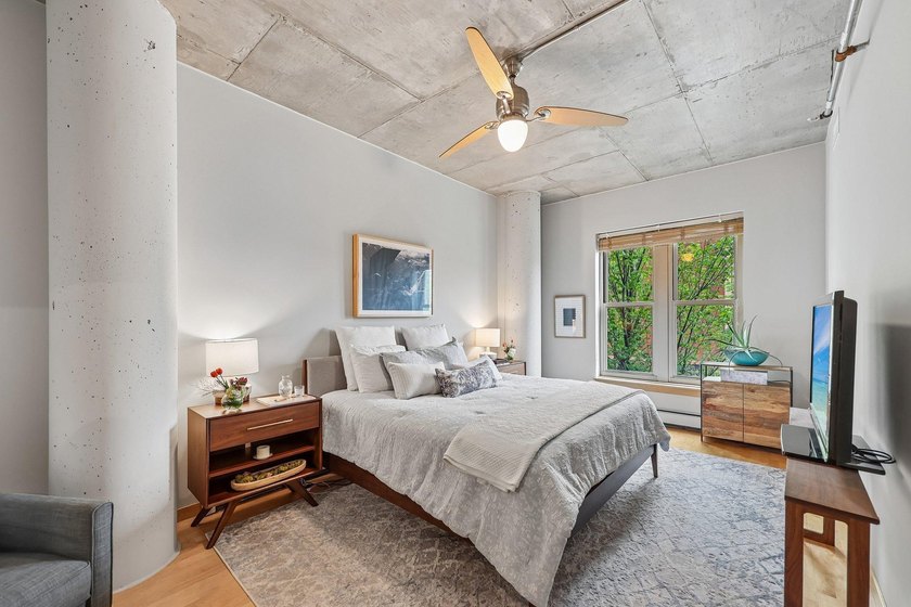 Welcome to 212 Lofts, where city living feels open, bright, and - photo 20