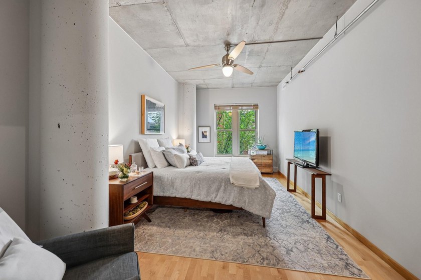 Welcome to 212 Lofts, where city living feels open, bright, and - photo 22
