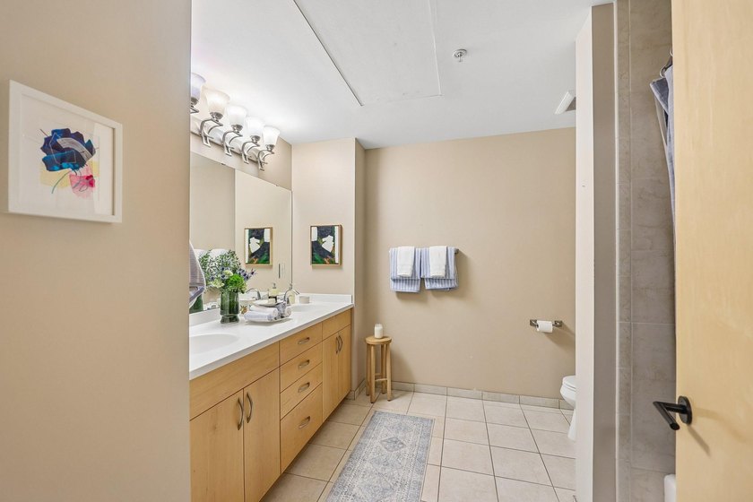 Welcome to 212 Lofts, where city living feels open, bright, and - photo 24