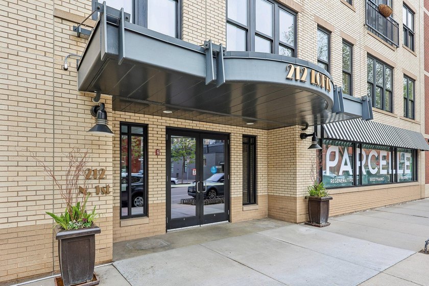 Welcome to 212 Lofts, where city living feels open, bright, and - photo 37