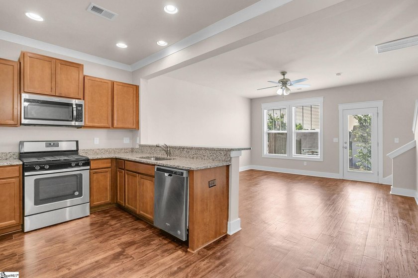 Move-in ready, low-maintenance townhome in the highly - photo 13