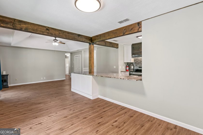 Discover this beautifully updated 3 bedroom, 2 bathroom home - photo 7