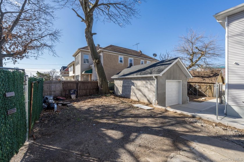 Welcome to this unique three-family home, a strong income - photo 4