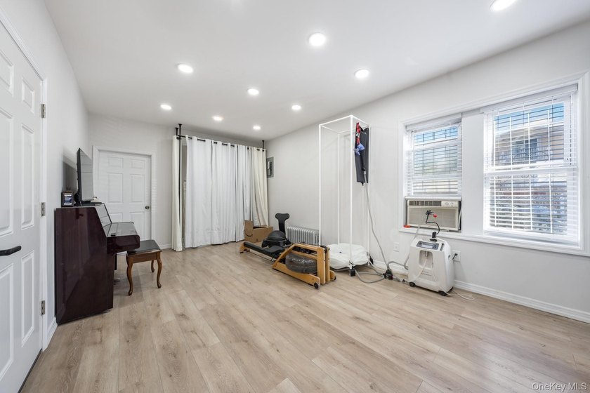 Welcome to this unique three-family home, a strong income - photo 5