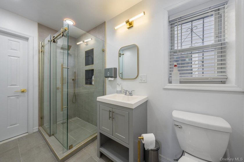 Welcome to this unique three-family home, a strong income - photo 10