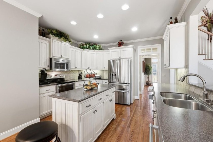 FANTASTIC TRADITIONAL WITH ROCKING CHAIR FRONT PORCH ON .72 ACRE - photo 15