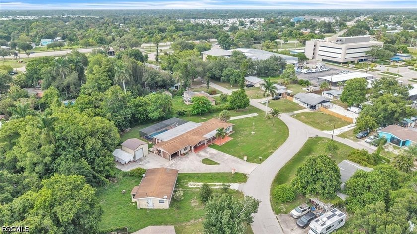Situated on a spacious 0.65-acre corner lot surrounded by mature - photo 42