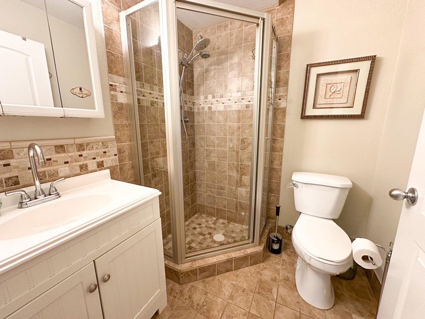 Charming 2-bedroom / 2-bath condo located in one of the - photo 11