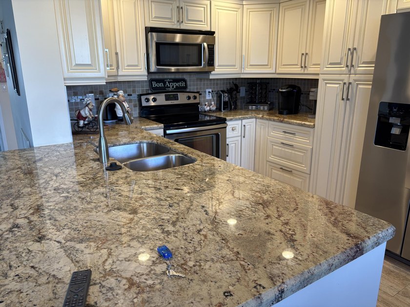 Discover this well-appointed two-bedroom, two-bathroom - photo 2