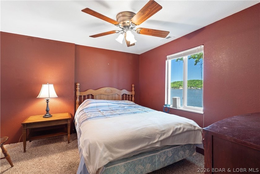Tucked away on the sought-after Little Niangua Arm, this 3 bed - photo 19