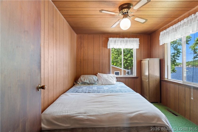 Tucked away on the sought-after Little Niangua Arm, this 3 bed - photo 24