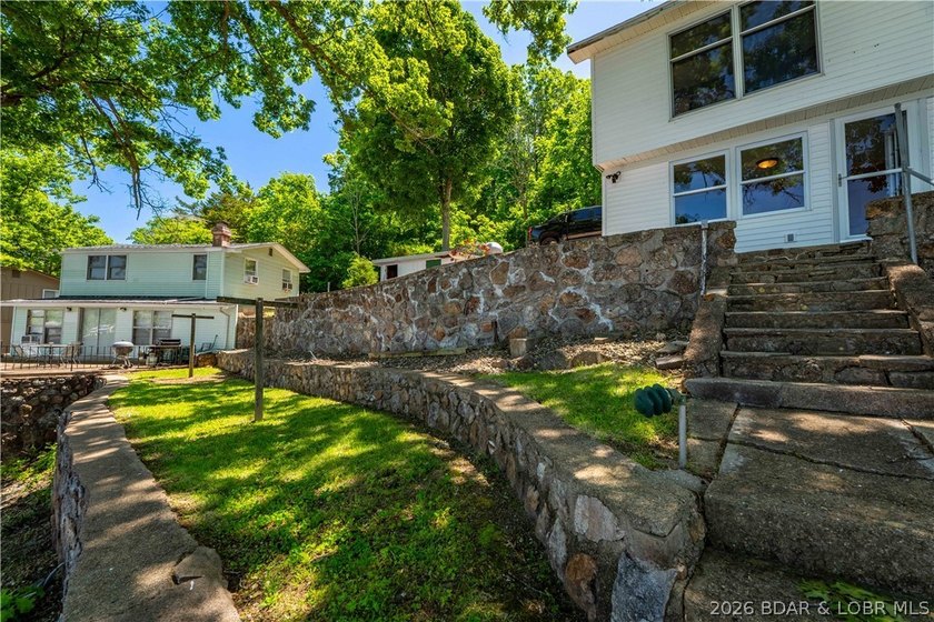 Tucked away on the sought-after Little Niangua Arm, this 3 bed - photo 35