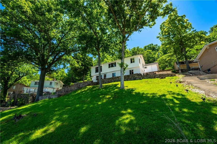 Tucked away on the sought-after Little Niangua Arm, this 3 bed - photo 36