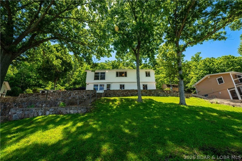 Tucked away on the sought-after Little Niangua Arm, this 3 bed - photo 37