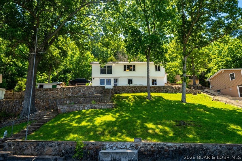 Tucked away on the sought-after Little Niangua Arm, this 3 bed - photo 39