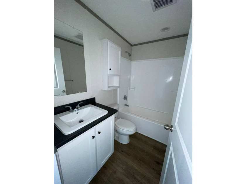 Welcome to this beautifully crafted 2-bedroom, 2-bath home at - photo 7