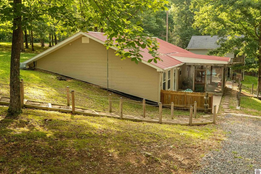 Kentucky Lake retreat with year-round water offering the perfect - photo 14