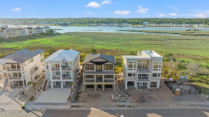 Perched in the highly-coveted gated community of The Pointe at - photo 2