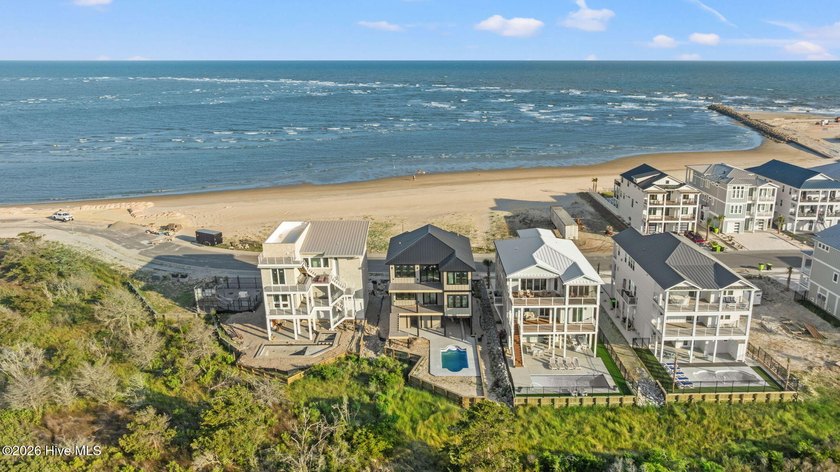 Perched in the highly-coveted gated community of The Pointe at - photo 4