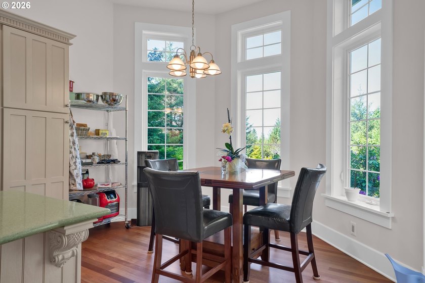 Tucked away on over an acre of wooded privacy, this custom - photo 11
