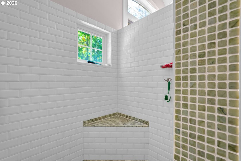 Tucked away on over an acre of wooded privacy, this custom - photo 19