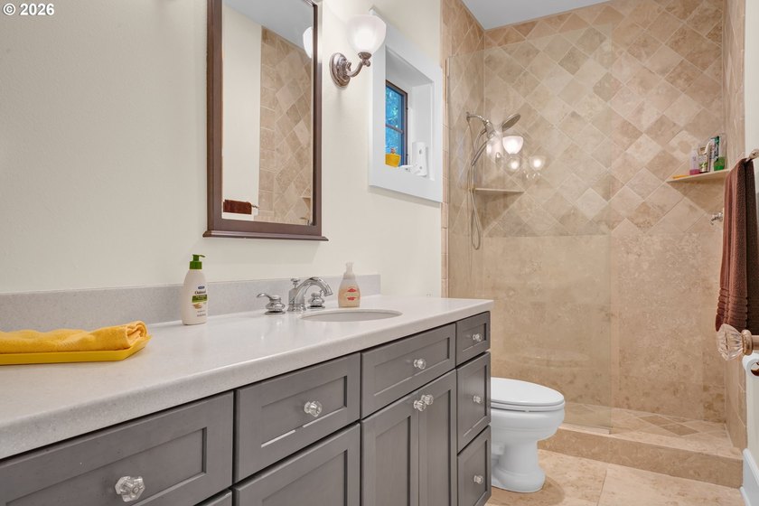 Tucked away on over an acre of wooded privacy, this custom - photo 22
