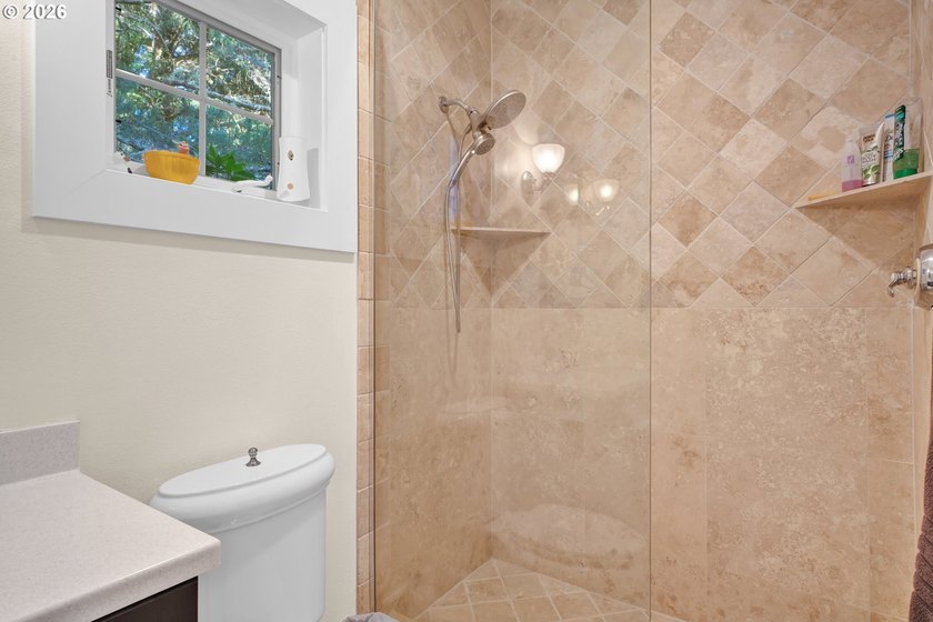 Tucked away on over an acre of wooded privacy, this custom - photo 23