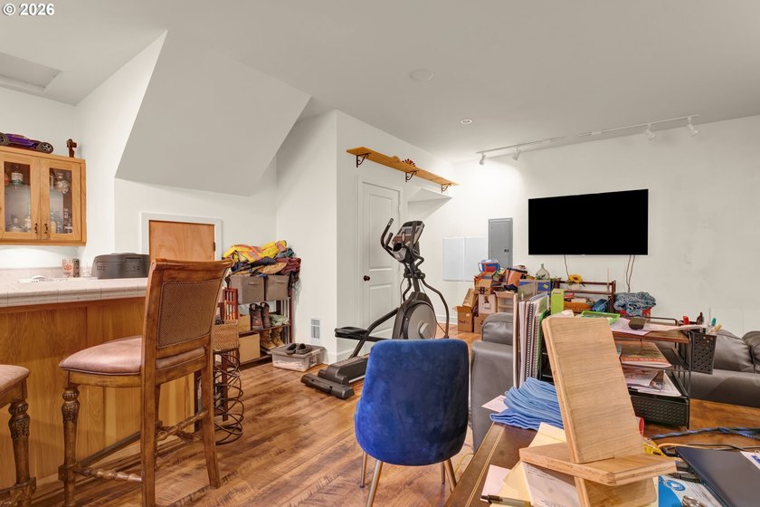 Tucked away on over an acre of wooded privacy, this custom - photo 27