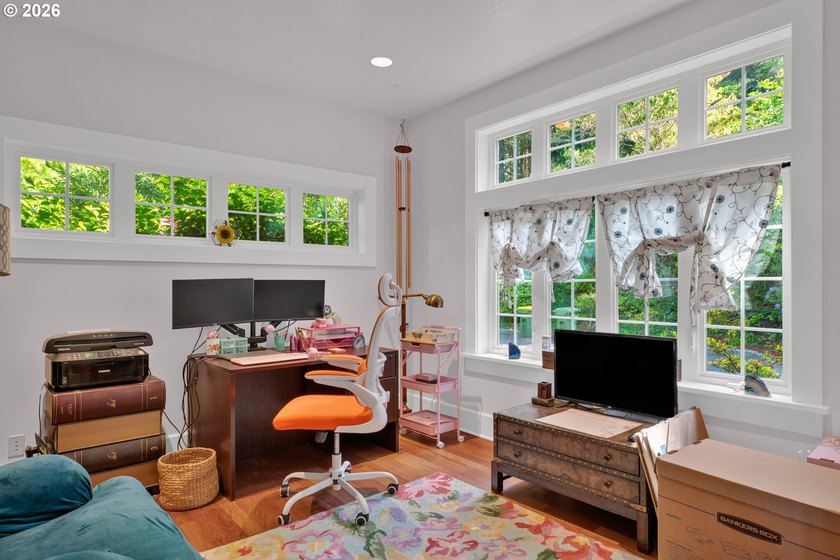 Tucked away on over an acre of wooded privacy, this custom - photo 29