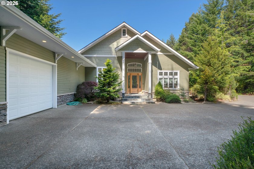 Tucked away on over an acre of wooded privacy, this custom - photo 38