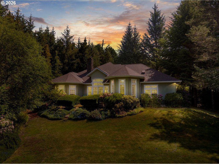 Tucked away on over an acre of wooded privacy, this custom - photo 47