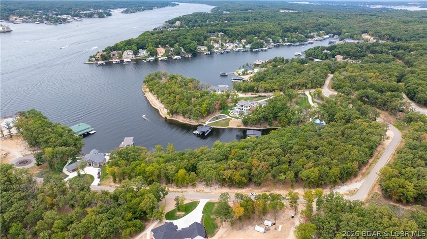 Offering almost 5 acres and 220' of shoreline, this double lot - photo 12