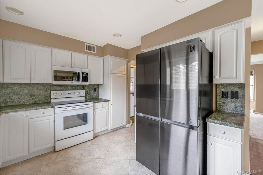 Welcome To 62 Tallmadge Trail in Miller Place! Beautifully - photo 15