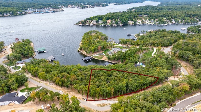 Offering almost 5 acres and 220' of shoreline, this double lot - photo 16