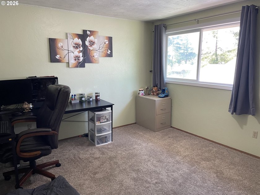 Bright, clean, and move-in ready, this desirable end-unit condo - photo 18