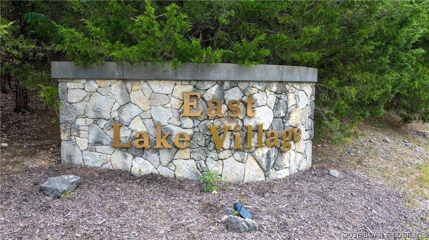 Offering almost 5 acres and 220' of shoreline, this double lot - photo 26