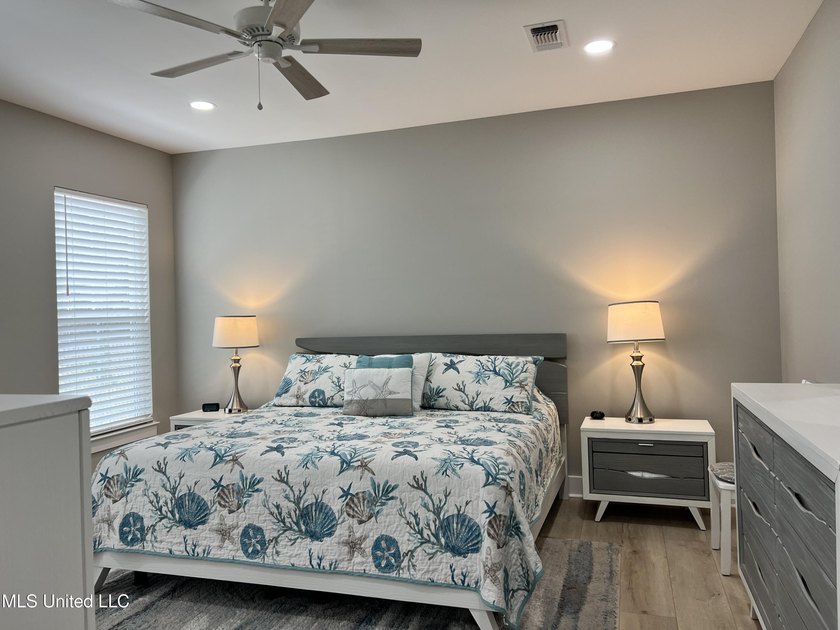 Wake up to coastal breezes and water views in this beautiful - photo 23