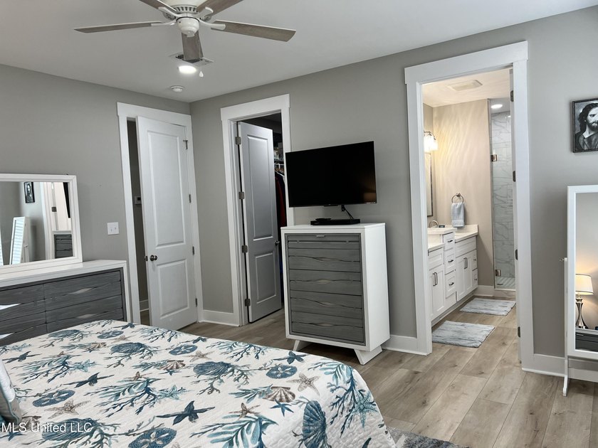 Wake up to coastal breezes and water views in this beautiful - photo 25