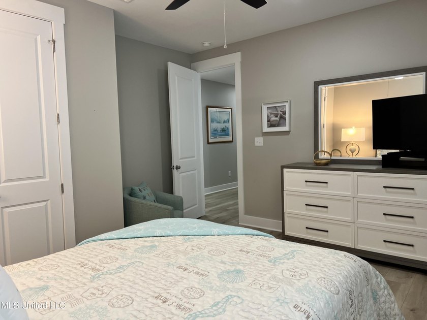 Wake up to coastal breezes and water views in this beautiful - photo 31