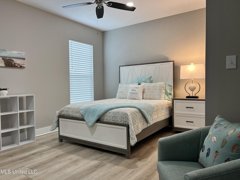 Wake up to coastal breezes and water views in this beautiful - photo 32