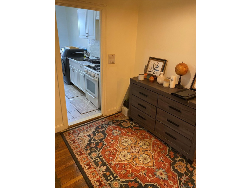 Renovated 1-bedroom, 1-bath co-op featuring a bright living and - photo 11