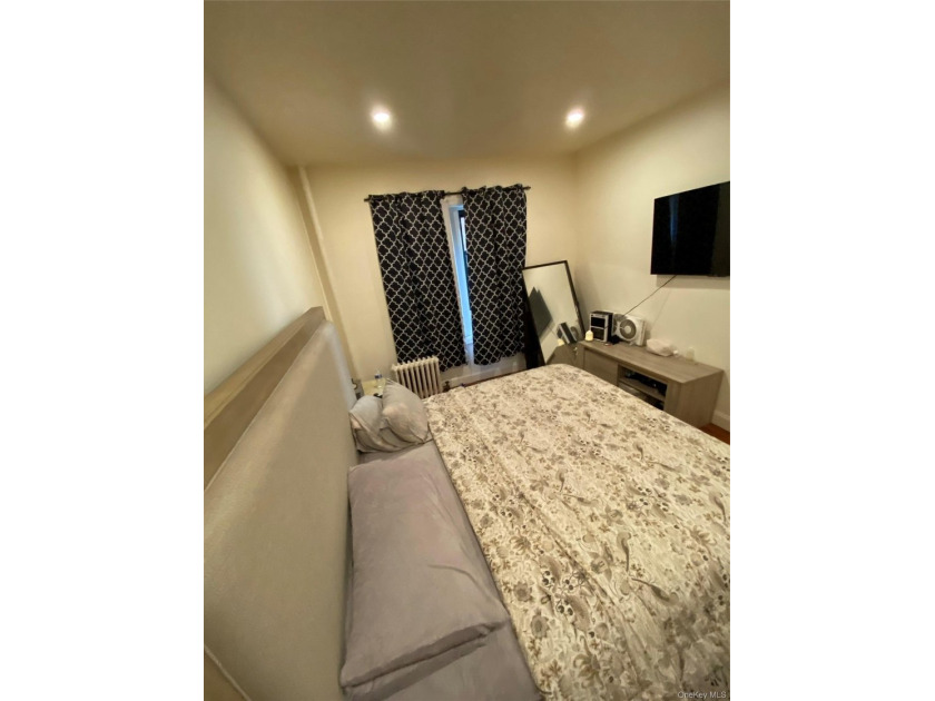 Renovated 1-bedroom, 1-bath co-op featuring a bright living and - photo 14